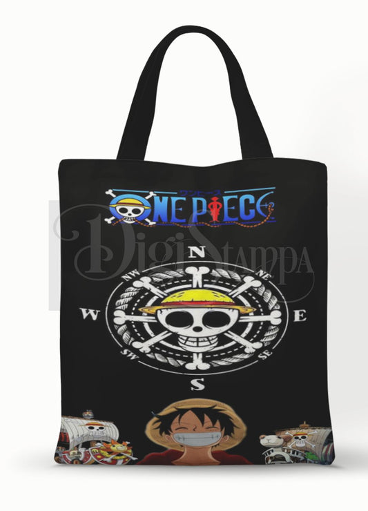 Ecobag personalizada One Piece: preta com bússola e caveira, com alças.