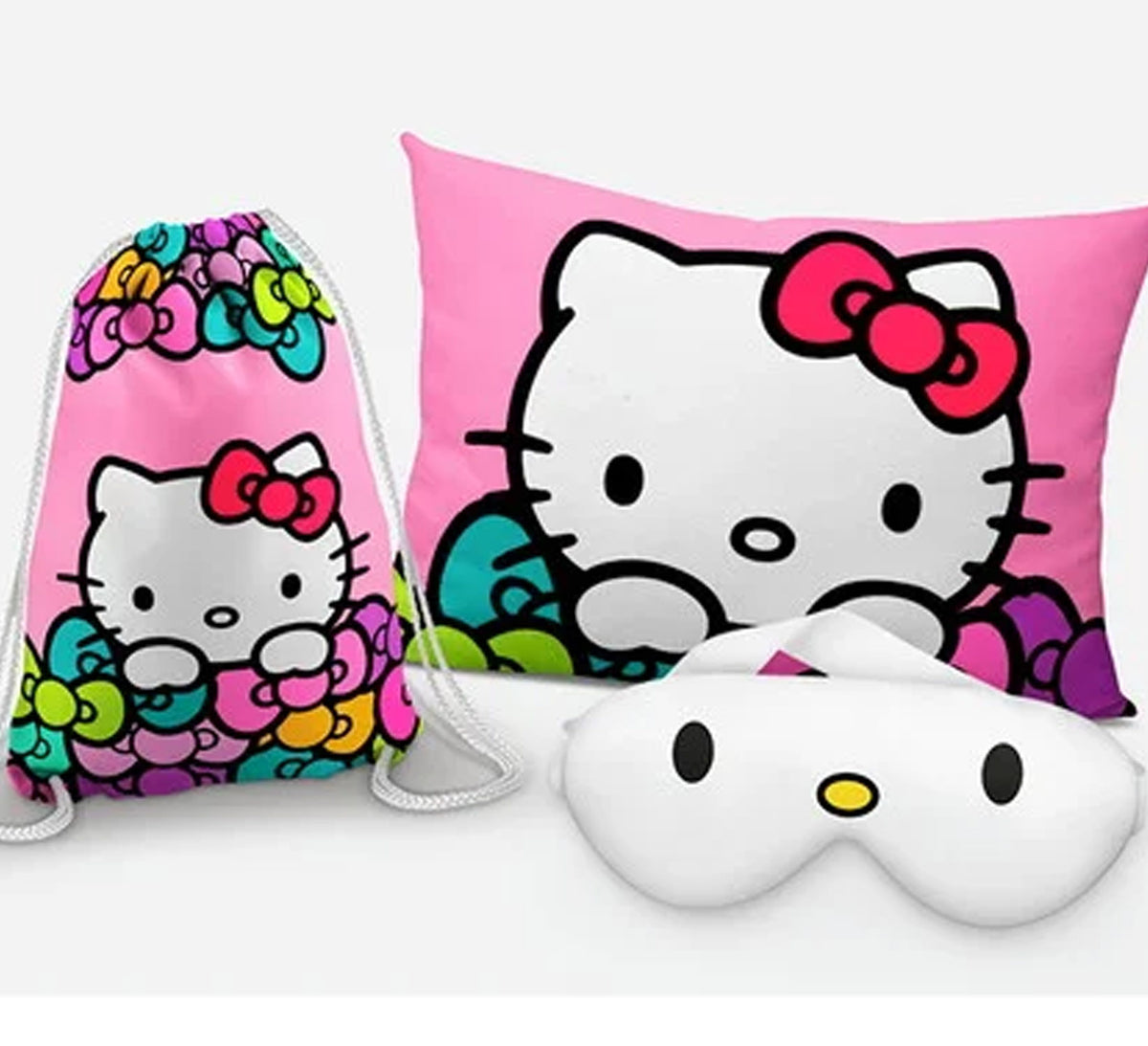 Kit Hello Kitty, rosa com laço vermelho, com almofada, sacochila e máscara de dormir.