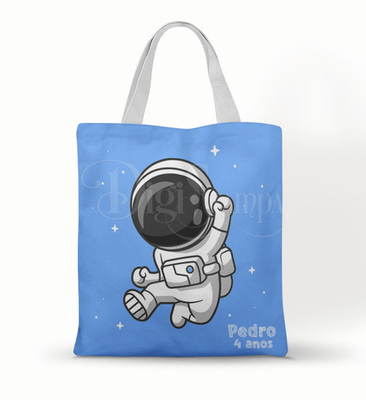 Ecobag personalizada Astronauta: azul com personagem, com alças.
